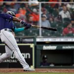 HOUSTON, TEXAS - APRIL 29: Taylor Trammell #20 of the Seattle Mariners hits a home run in the third inning against the Houston Astros at Minute Maid Park on April 29, 2021 in Houston, Texas. (Photo by Bob Levey/Getty Images)