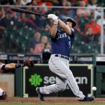HOUSTON, TEXAS - APRIL 29: Kyle Seager #15 of the Seattle Mariners fouls a ball off his foot in the third inning against the Houston Astros at Minute Maid Park on April 29, 2021 in Houston, Texas. (Photo by Bob Levey/Getty Images)