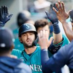 SEATTLE, WASHINGTON - APRIL 30: Mitch Haniger #17 of the Seattle Mariners reacts adfter his home run against the Los Angeles Angels in the first inning at T-Mobile Park on April 30, 2021 in Seattle, Washington. (Photo by Steph Chambers/Getty Images)