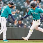 SEATTLE, WASHINGTON - APRIL 30: Dylan Moore #25 of the Seattle Mariners reacts after his home run against the Los Angeles Angels in the second inning at T-Mobile Park on April 30, 2021 in Seattle, Washington. (Photo by Steph Chambers/Getty Images)