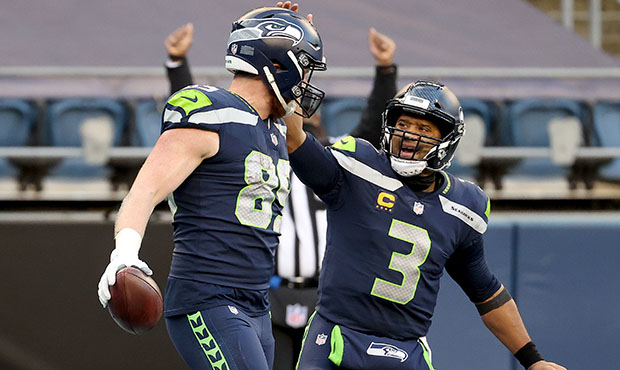 Seahawks TE Will Dissly, QB Russell Wilson...