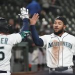 The Mariners came back to beat the Giants 8-7 on opening night. (AP)