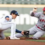 SEATTLE, WA - May 01: Shohei Ohtani #17 of the Los Angeles Angels steals second base before second baseman Dylan Moore #25 of the Seattle Mariners can make a tag during the first inning of a game at T-Mobile Park on May 1, 2021 in Seattle, Washington. (Photo by Stephen Brashear/Getty Images)