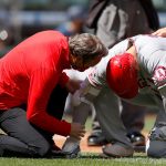 SEATTLE, WASHINGTON - MAY 02: Shohei Ohtani #17 of the Los Angeles Angels is checked on after he was hit by a pitch during the first inning against the Seattle Mariners at T-Mobile Park on May 02, 2021 in Seattle, Washington. (Photo by Steph Chambers/Getty Images)