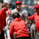 SEATTLE, WASHINGTON - MAY 02: Shohei Ohtani #17 of the Los Angeles Angels is checked on after he was hit by a pitch during the first inning against the Seattle Mariners at T-Mobile Park on May 02, 2021 in Seattle, Washington. (Photo by Steph Chambers/Getty Images)