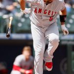 SEATTLE, WASHINGTON - MAY 02: Albert Pujols #5 of the Los Angeles Angels is hit by a pitch in the second inning against the Seattle Mariners at T-Mobile Park on May 02, 2021 in Seattle, Washington. (Photo by Steph Chambers/Getty Images)