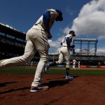 SEATTLE, WASHINGTON - MAY 02: The Seattle Mariners take the field during the first inning against the Los Angeles Angels at T-Mobile Park on May 02, 2021 in Seattle, Washington. (Photo by Steph Chambers/Getty Images)