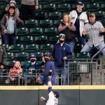 SEATTLE, WASHINGTON - MAY 03: Mitch Haniger #17 of the Seattle Mariners cannot catch a ball off the bat of Cedric Mullins of the Baltimore Orioles that went for a home run in the eighth inning at T-Mobile Park on May 03, 2021 in Seattle, Washington. (Photo by Steph Chambers/Getty Images)