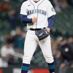 SEATTLE, WASHINGTON - MAY 04: Robert Dugger #30 of the Seattle Mariners reacts after defeating the Baltimore Orioles 5-2 at T-Mobile Park on May 04, 2021 in Seattle, Washington. (Photo by Steph Chambers/Getty Images)