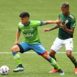PORTLAND, OREGON - MAY 09: Fredy Montero #12 of Seattle Sounders controls the ball against Andy Polo #7 of Portland Timbers in the second half at Providence Park on May 09, 2021 in Portland, Oregon. (Photo by Abbie Parr/Getty Images)