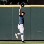 SEATTLE, WASHINGTON - MAY 13: Jarred Kelenic #10 of the Seattle Mariners warms up before the game against the Cleveland Indians at T-Mobile Park on May 13, 2021 in Seattle, Washington. (Photo by Steph Chambers/Getty Images)