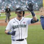 SEATTLE, WASHINGTON - MAY 15: Mitch Haniger #17 of the Seattle Mariners celebrates after his home run against the Cleveland Indians during the first inning at T-Mobile Park on May 15, 2021 in Seattle, Washington. (Photo by Steph Chambers/Getty Images)