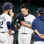 SEATTLE, WASHINGTON - MAY 17: Pitching coach Pete Woodworth #32 talks with Yusei Kikuchi #18 of the Seattle Mariners during the first inning against the Detroit Tigers at T-Mobile Park on May 17, 2021 in Seattle, Washington. (Photo by Steph Chambers/Getty Images)