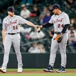 SEATTLE, WASHINGTON - MAY 18: Spencer Turnbull #56 and Miguel Cabrera #24 of the Detroit Tigers bump fists during the third inning against the Seattle Mariners at T-Mobile Park on May 18, 2021 in Seattle, Washington. (Photo by Steph Chambers/Getty Images)
