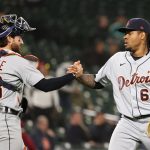 SEATTLE, WASHINGTON - MAY 19: Eric Haase #13 and Gregory Soto #65 of the Detroit Tigers shake hands after forcing the final out to defeat the Seattle Mariners 6-2 at T-Mobile Park on May 19, 2021 in Seattle, Washington. (Photo by Abbie Parr/Getty Images)