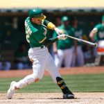 OAKLAND, CALIFORNIA - MAY 26: Ramon Laureano #22 of the Oakland Athletics hits an RBI single in the bottom of the fourth inning against the Seattle Mariners at RingCentral Coliseum on May 26, 2021 in Oakland, California. (Photo by Lachlan Cunningham/Getty Images)