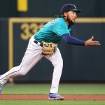 SEATTLE, WASHINGTON - MAY 28: J.P. Crawford #3 of the Seattle Mariners tosses the ball to second base to force an out during the fifth inning against the Texas Rangers at T-Mobile Park on May 28, 2021 in Seattle, Washington. (Photo by Abbie Parr/Getty Images)