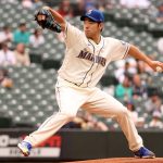 SEATTLE, WASHINGTON - MAY 30: Yusei Kikuchi #18 of the Seattle Mariners pitches during the first inning against the Texas Rangers at T-Mobile Park on May 30, 2021 in Seattle, Washington. (Photo by Abbie Parr/Getty Images)
