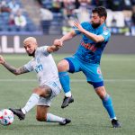 SEATTLE, WASHINGTON - MAY 30: Diego Fagundez #14 of Austin FC and Joao Paulo #6 of Seattle Sounders battle for the ball during the second half at Lumen Field on May 30, 2021 in Seattle, Washington. (Photo by Steph Chambers/Getty Images)