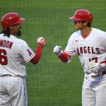 ANAHEIM, CA - JUNE 05: Shohei Ohtani #17 of the Los Angeles Angels is congratulated by Anthony Rendon #6 after hitting a solo home run in the first inning of the game against the Seattle Mariners at Angel Stadium of Anaheim on June 5, 2021 in Anaheim, California. (Photo by Jayne Kamin-Oncea/Getty Images)