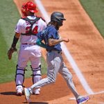 ANAHEIM, CA - JUNE 06: J.P. Crawford #3 of the Seattle Mariners crosses the plate for a run in the first inning of the game against the Los Angeles Angels at Angel Stadium of Anaheim on June 6, 2021 in Anaheim, California. (Photo by Jayne Kamin-Oncea/Getty Images)