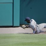 DETROIT, MI -  JUNE 10:  Center fielder Taylor Trammell #20 of the Seattle Mariners misplays a RBI-triple hit by Jake Rogers of the Detroit Tigers during the seventh inning at Comerica Park on June 10, 2021, in Detroit, Michigan. The Tigers defeated the Mariners 8-3. (Photo by Duane Burleson/Getty Images)