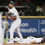 SEATTLE, WASHINGTON - JUNE 02: Elvis Andrus #17 of the Oakland Athletics reacts after a double play over Jack Mayfield #8 of the Seattle Mariners in the eighth inning during Lou Gehrig Day at T-Mobile Park on June 02, 2021 in Seattle, Washington. (Photo by Steph Chambers/Getty Images)