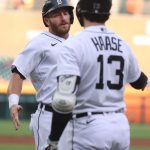 DETROIT, MICHIGAN - JUNE 08: Robbie Grossman #8 of the Detroit Tigers celebrates scoring a first inning run with Eric Haase #13 while playing the Seattle Mariners at Comerica Park on June 08, 2021 in Detroit, Michigan. (Photo by Gregory Shamus/Getty Images)