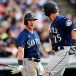 CLEVELAND, OHIO - JUNE 12: Dylan Moore #25 of the Seattle Mariners celebrates his solo home run in the seventh inning with Jake Bauers #5 during their game against the Cleveland Indians at Progressive Field on June 12, 2021 in Cleveland, Ohio. (Photo by Emilee Chinn/Getty Images)