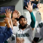 SEATTLE, WASHINGTON - JUNE 14: J.P. Crawford #3 of the Seattle Mariners reacts after he scored a run against the Minnesota Twins during the third inning at T-Mobile Park on June 14, 2021 in Seattle, Washington. (Photo by Steph Chambers/Getty Images)