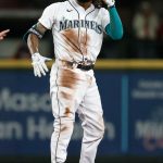 SEATTLE, WASHINGTON - JUNE 14: J.P. Crawford #3 of the Seattle Mariners reacts after his double against the Minnesota Twins during the third inning at T-Mobile Park on June 14, 2021 in Seattle, Washington. (Photo by Steph Chambers/Getty Images)