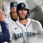 SEATTLE, WASHINGTON - JUNE 14: Ty France #23 of the Seattle Mariners reacts after he scored a run on an RBI triple by Dylan Moore #25 against the Minnesota Twins during the fifth inning at T-Mobile Park on June 14, 2021 in Seattle, Washington. (Photo by Steph Chambers/Getty Images)