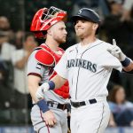 SEATTLE, WASHINGTON - JUNE 14: Jake Bauers #5 of the Seattle Mariners reacts after his home run during the eighth inning against the Minnesota Twins at T-Mobile Park on June 14, 2021 in Seattle, Washington. (Photo by Steph Chambers/Getty Images)