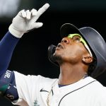 SEATTLE, WASHINGTON - JUNE 14: Shed Long Jr. #4 of the Seattle Mariners reacts after his single during the eighth inning against the Minnesota Twins at T-Mobile Park on June 14, 2021 in Seattle, Washington. (Photo by Steph Chambers/Getty Images)