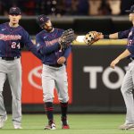 SEATTLE, WASHINGTON - JUNE 16: (L-R) Trevor Larnach #24, Gilberto Celestino #79 and Alex Kirilloff #19 of the Minnesota Twins celebrate after defeating the Seattle Mariners 7-2 at T-Mobile Park on June 16, 2021 in Seattle, Washington. (Photo by Abbie Parr/Getty Images)
