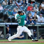 SEATTLE, WASHINGTON - JUNE 18: Ty France #23 of the Seattle Mariners hits the ball during the game against the Tampa Bay Rays at T-Mobile Park on June 18, 2021 in Seattle, Washington. (Photo by Alika Jenner/Getty Images)