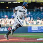 SEATTLE, WASHINGTON - JUNE 19: J.P. Crawford #3 of the Seattle Mariners rounds third base after hitting a grand slam during the game against the Tampa Bay Rays at T-Mobile Park on June 19, 2021 in Seattle, Washington. (Photo by Alika Jenner/Getty Images)
