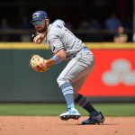 SEATTLE, WASHINGTON - JUNE 20: Brandon Lowe #8 of the Tampa Bay Rays throws the ball to first base during the game against the Seattle Mariners at T-Mobile Park on June 20, 2021 in Seattle, Washington. (Photo by Alika Jenner/Getty Images)