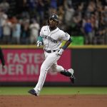 SEATTLE, WASHINGTON - JUNE 22: Shed Long Jr. #4 of the Seattle Mariners rounds the bases after hitting a home run during the game against the Colorado Rockies at T-Mobile Park on June 22, 2021 in Seattle, Washington. (Photo by Alika Jenner/Getty Images)