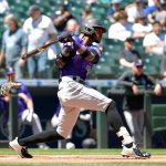SEATTLE, WASHINGTON - JUNE 23: Raimel Tapia #15 of the Colorado Rockies bats during the game against the Seattle Mariners at T-Mobile Park on June 23, 2021 in Seattle, Washington. (Photo by Alika Jenner/Getty Images)