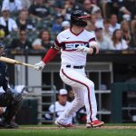 CHICAGO, ILLINOIS - JUNE 27: Zack Collins #21 of the Chicago White Sox hits a RBI double in the third inning against the Seattle Mariners at Guaranteed Rate Field on June 27, 2021 in Chicago, Illinois. (Photo by Quinn Harris/Getty Images)