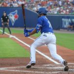 BUFFALO, NEW YORK - JUNE 29: Marcus Semien #10 of the Toronto Blue Jays hits a two-run double during the second inning against the Seattle Mariners at Sahlen Field on June 29, 2021 in Buffalo, New York. (Photo by Joshua Bessex/Getty Images)