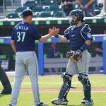 BUFFALO, NY - JULY 1: Paul Sewald #37 of the Seattle Mariners celebrates with Luis Torrens #22 after beating the Toronto Blue Jays at Sahlen Field on July 1, 2021 in Buffalo, New York. (Photo by Kevin Hoffman/Getty Images)