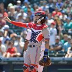 SEATTLE, WASHINGTON - JULY 04: Jonah Heim #28 of the Texas Rangers is seen in 4th of July-themed gear during the first inning of the game against the Seattle Mariners at T-Mobile Park on July 04, 2021 in Seattle, Washington. (Photo by Alika Jenner/Getty Images)