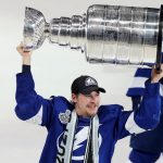 TAMPA, FLORIDA - JULY 07:  Yanni Gourde #37 of the Tampa Bay Lightning celebrates with the Stanley Cup after the 1-0 victory against the Montreal Canadiens in Game Five to win the 2021 NHL Stanley Cup Final at Amalie Arena on July 07, 2021 in Tampa, Florida. (Photo by Mike Carlson/Getty Images)