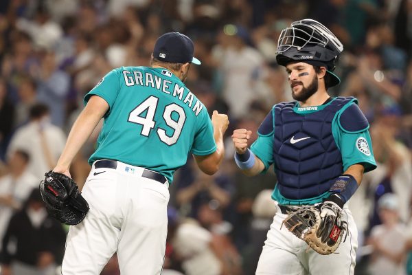 Mitch Haniger of the Seattle Mariners reacts after hitting a two-run single  in the eighth inning of a game against the Los Angeles Angels on Oct. 2,  2021, at T-Mobile Park in