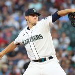 SEATTLE, WASHINGTON - JULY 10: Chris Flexen #77 of the Seattle Mariners pitches during the sixth inning against the Los Angeles Angels at T-Mobile Park on July 10, 2021 in Seattle, Washington. (Photo by Abbie Parr/Getty Images)