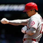 SEATTLE, WASHINGTON - JULY 11: Shohei Ohtani #17 of the Los Angeles Angels reacts after reaching third base against the Seattle Mariners during the first inning at T-Mobile Park on July 11, 2021 in Seattle, Washington. (Photo by Steph Chambers/Getty Images)