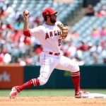 ANAHEIM, CALIFORNIA - JULY 18: David Fletcher #22 of the Los Angeles Angels makes the throw to first base against the Seattle Mariners during the second inning at Angel Stadium of Anaheim on July 18, 2021 in Anaheim, California. (Photo by Katelyn Mulcahy/Getty Images)