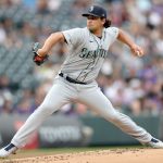 DENVER, COLORADO - JULY 20: Starting pitcher Marco Gonzales #7 of the Seattle Mariners throws against the Colorado Rockies in the first inning at Coors Field on July 20, 2021 in Denver, Colorado. (Photo by Matthew Stockman/Getty Images)